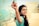 a woman holding a kite in her hand