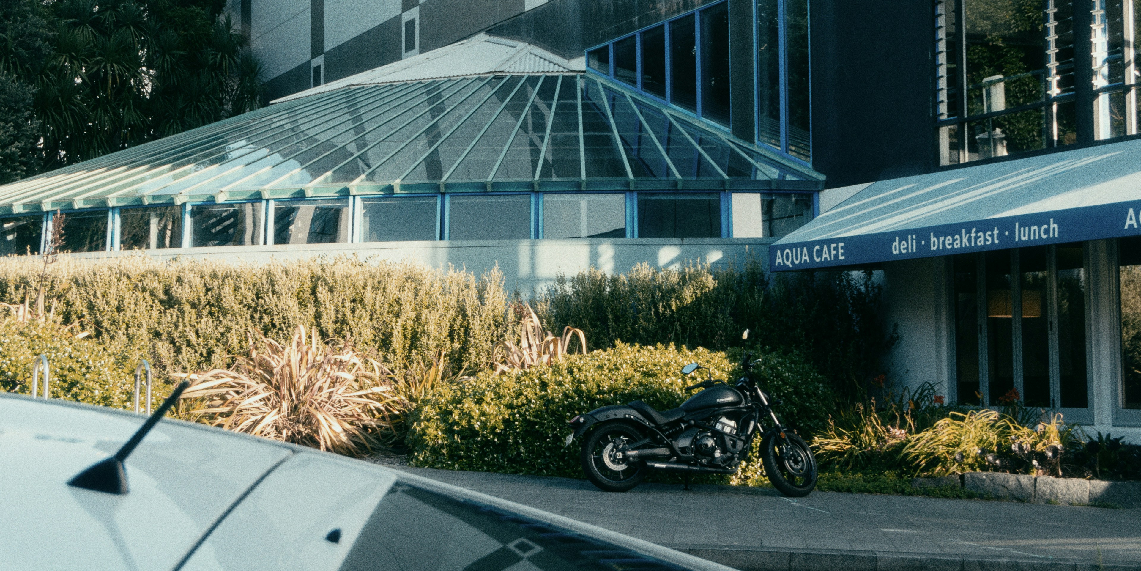 a motorcycle parked in front of a building