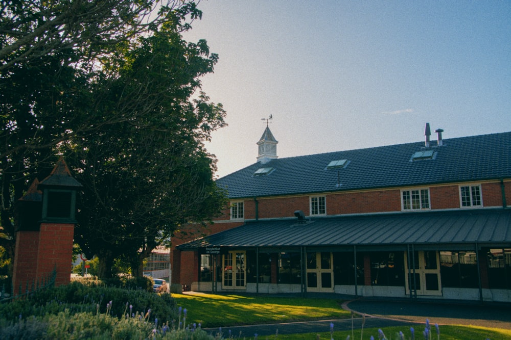 a red brick building with a clock tower