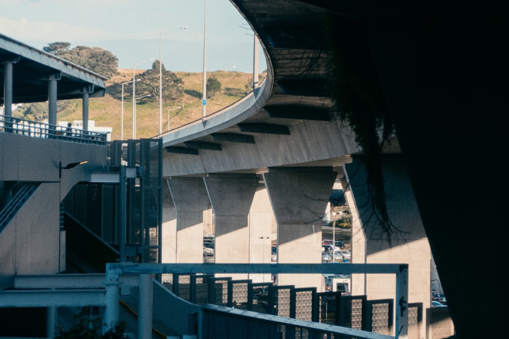 a view of a freeway with a bridge in the background