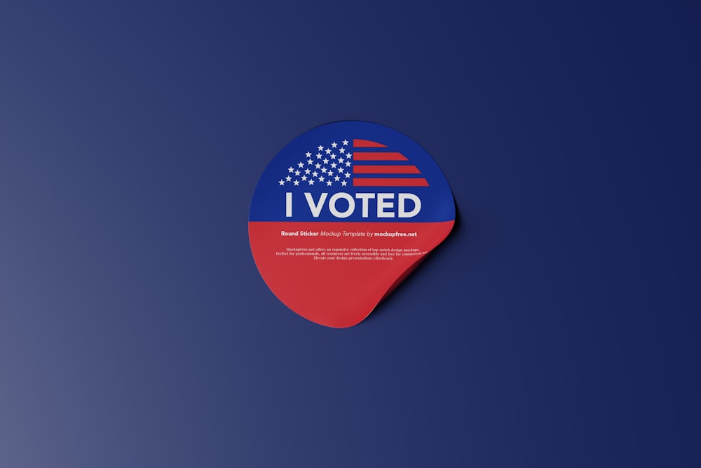 a red, white and blue sticker that says i vote