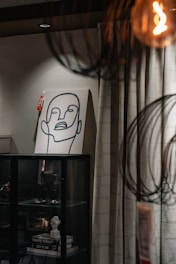 a drawing of a man's face on a piece of paper