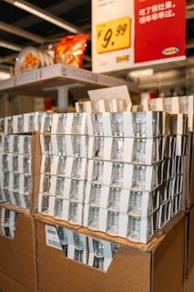 a bunch of cups that are sitting on a box