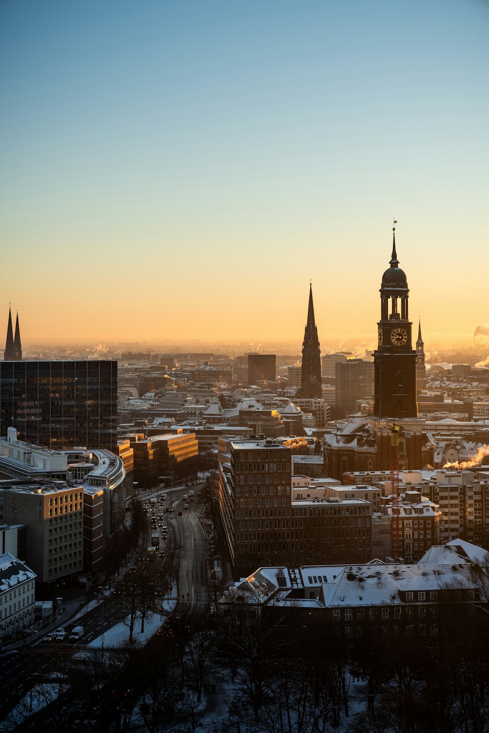 a view of a city with a clock tower