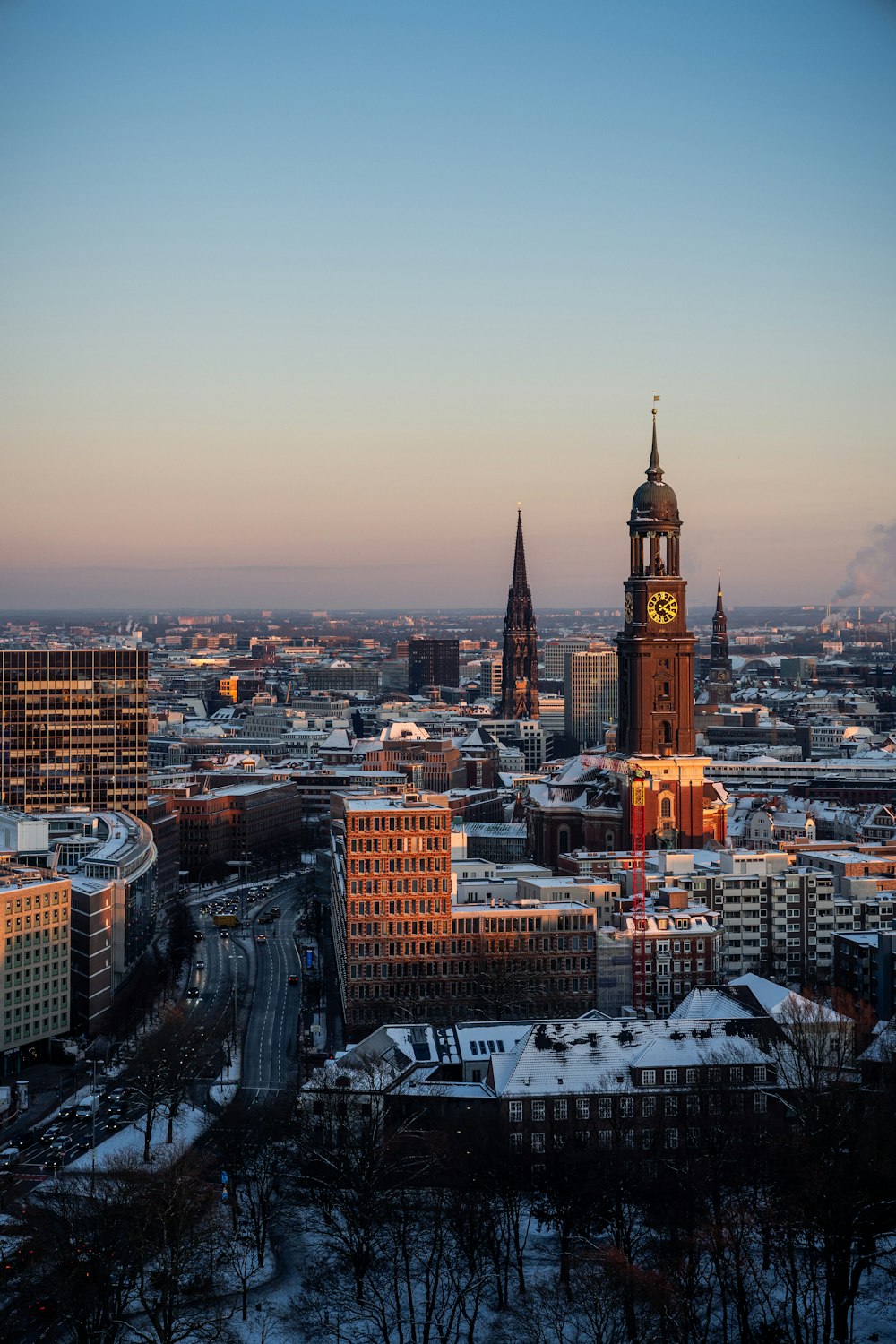 a view of a city with a clock tower