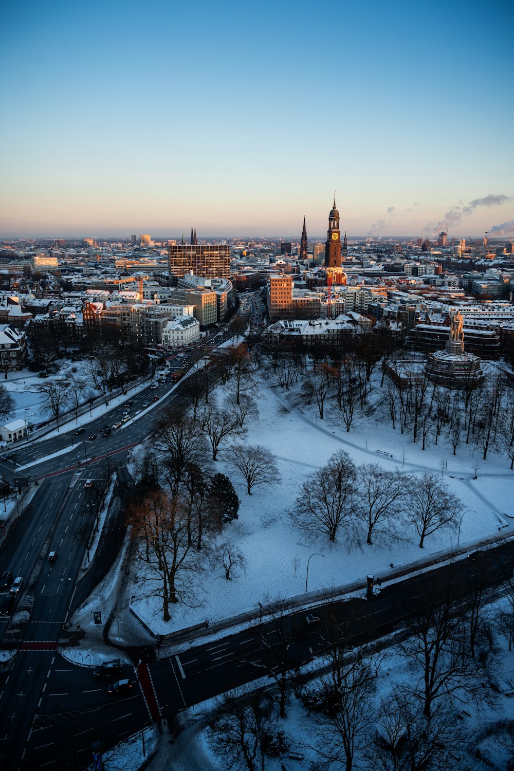 an aerial view of a city in winter