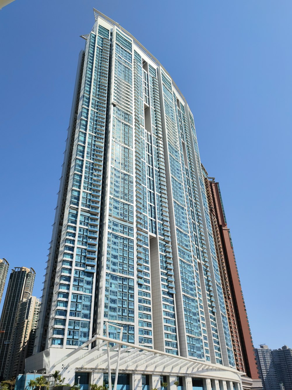 a tall building with many windows on the side of it