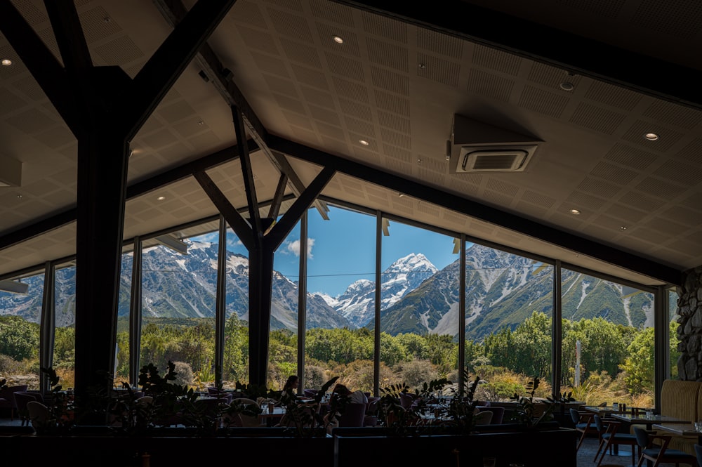 a restaurant with a view of the mountains