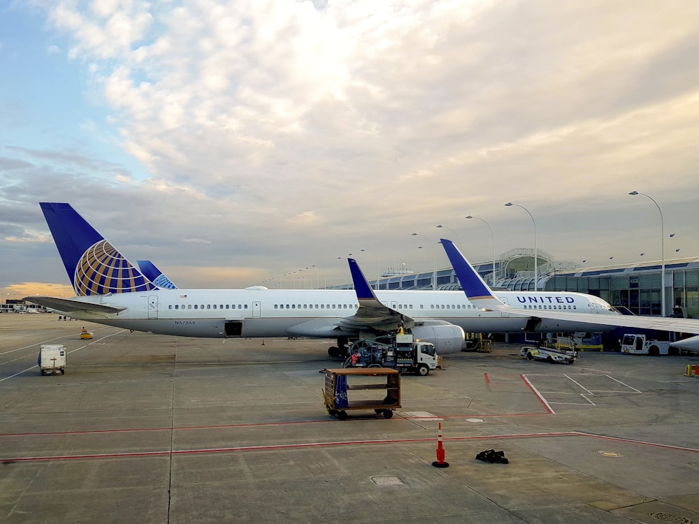 a large jetliner sitting on top of an airport tarmac