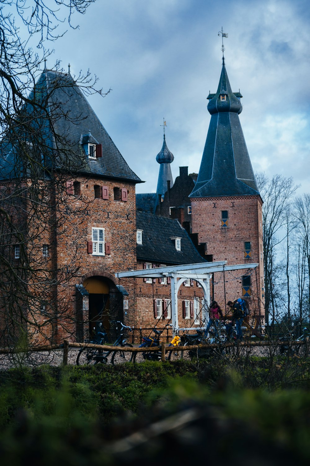 a large brick building with a clock tower