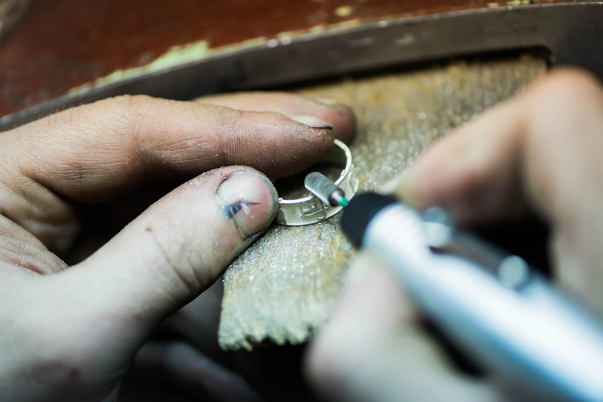 A person putting a ring on another person's finger