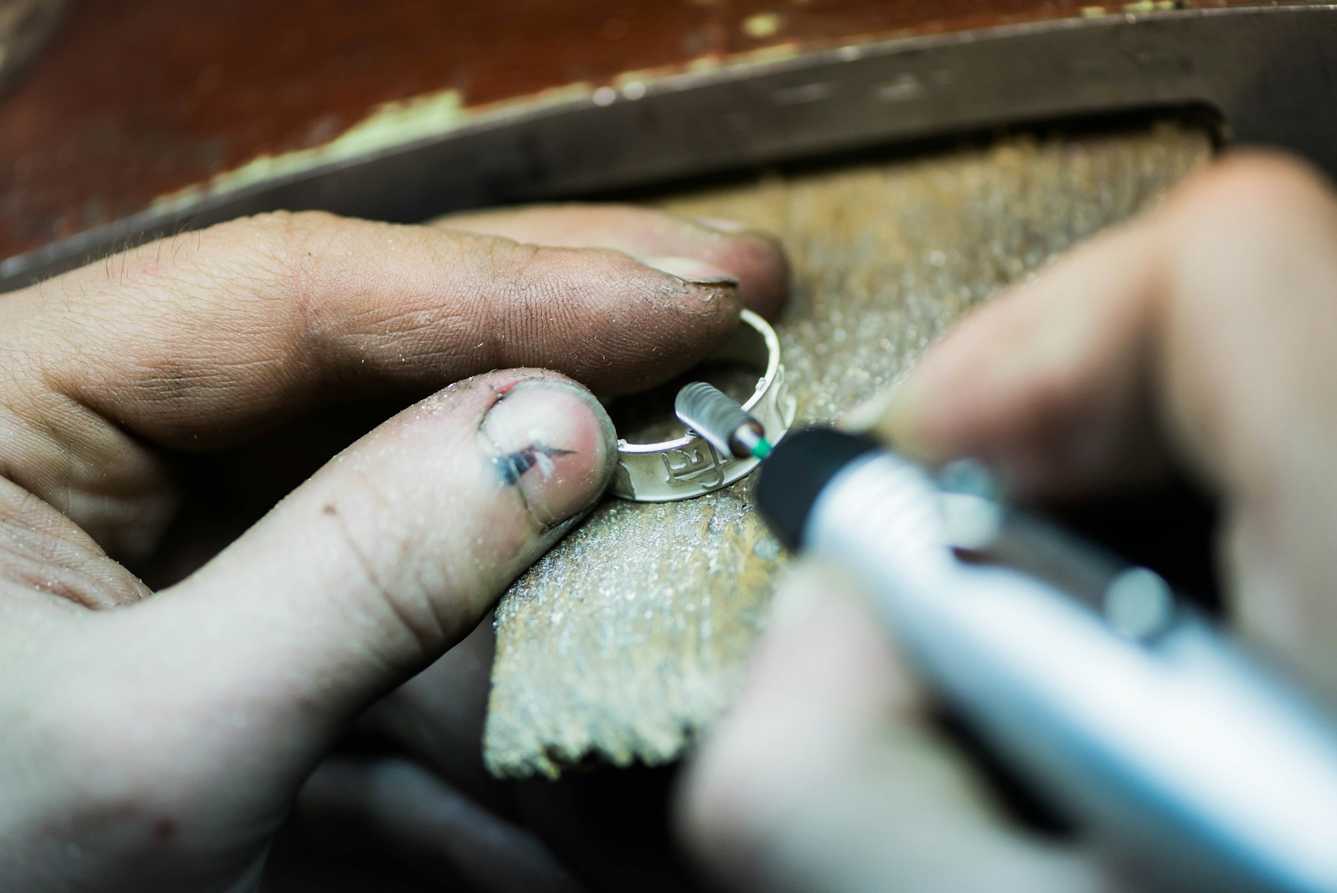 a person is putting a ring on another person's finger