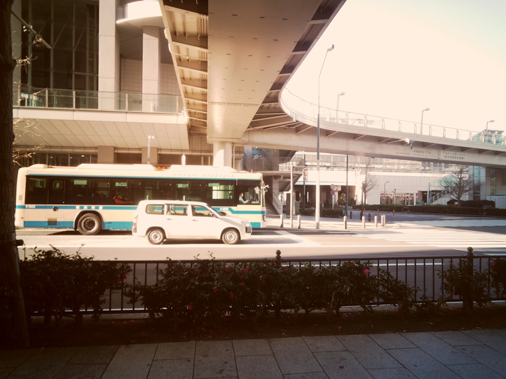 a bus is parked in front of a building