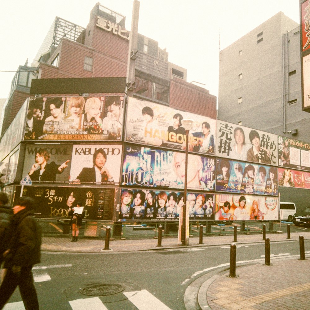 a city street filled with lots of billboards