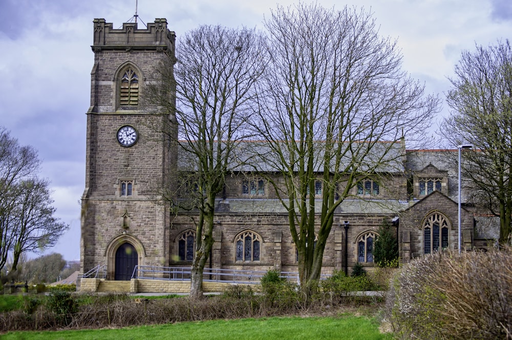 a large brick building with a clock tower