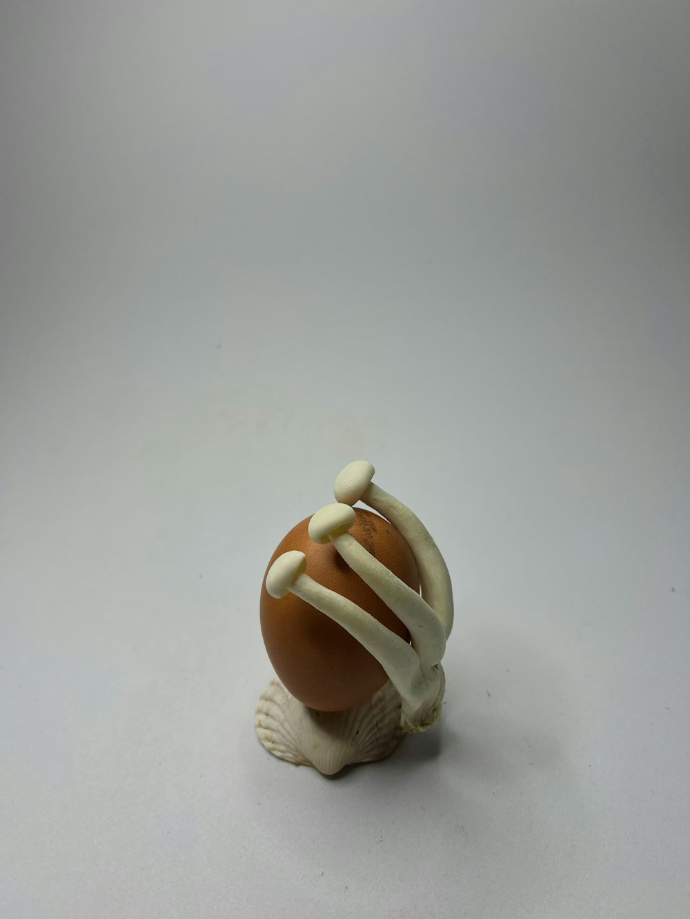 a brown and white object sitting on top of a table