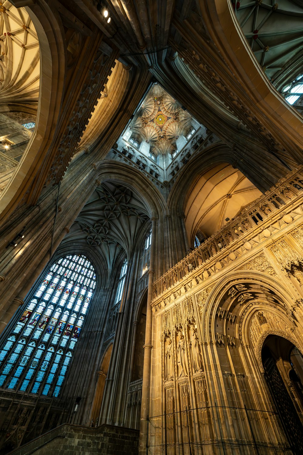 the ceiling of a large cathedral with many windows