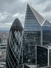 a view of some very tall buildings in the city