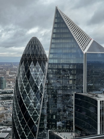 a view of some very tall buildings in the city