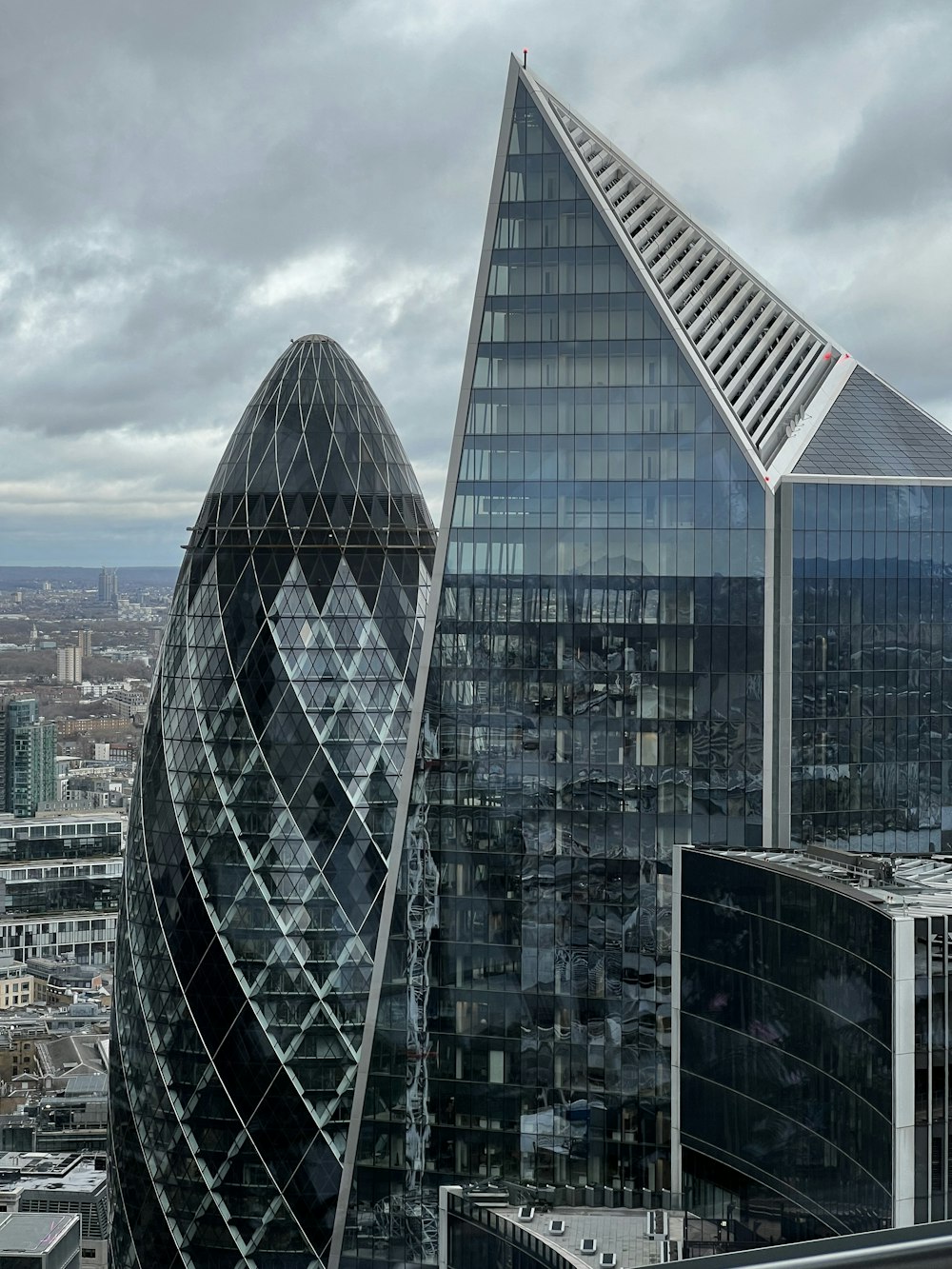 a view of some very tall buildings in the city