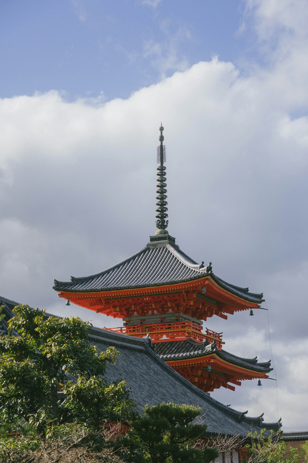 a tall building with a tower in the middle of it