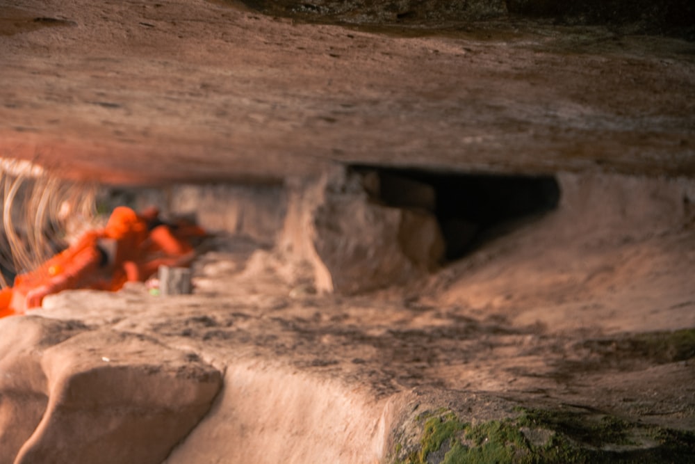 a group of people standing in a cave