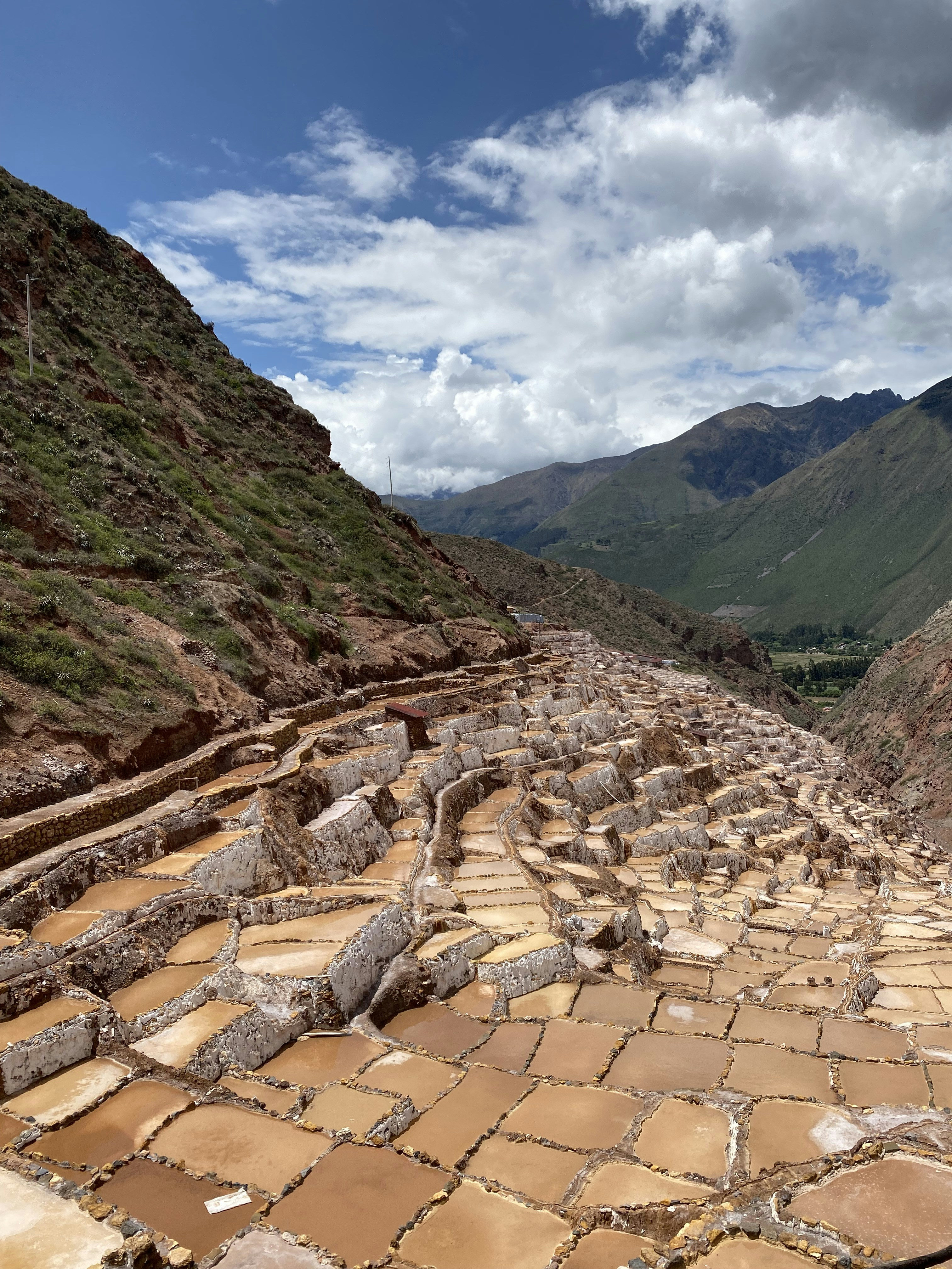 Salt terraces of Maras shimmering in sunlight