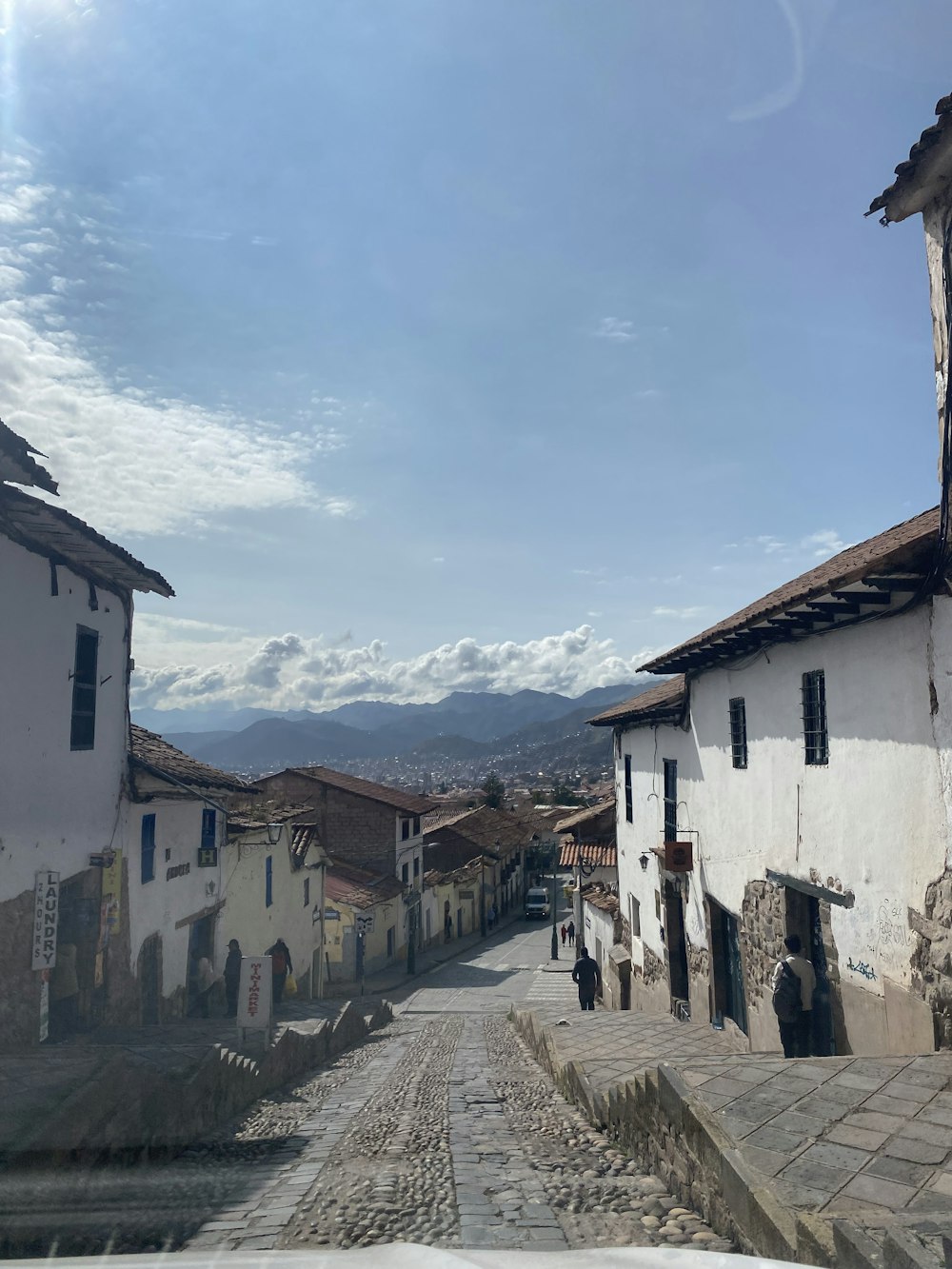 a cobblestone street in a small village