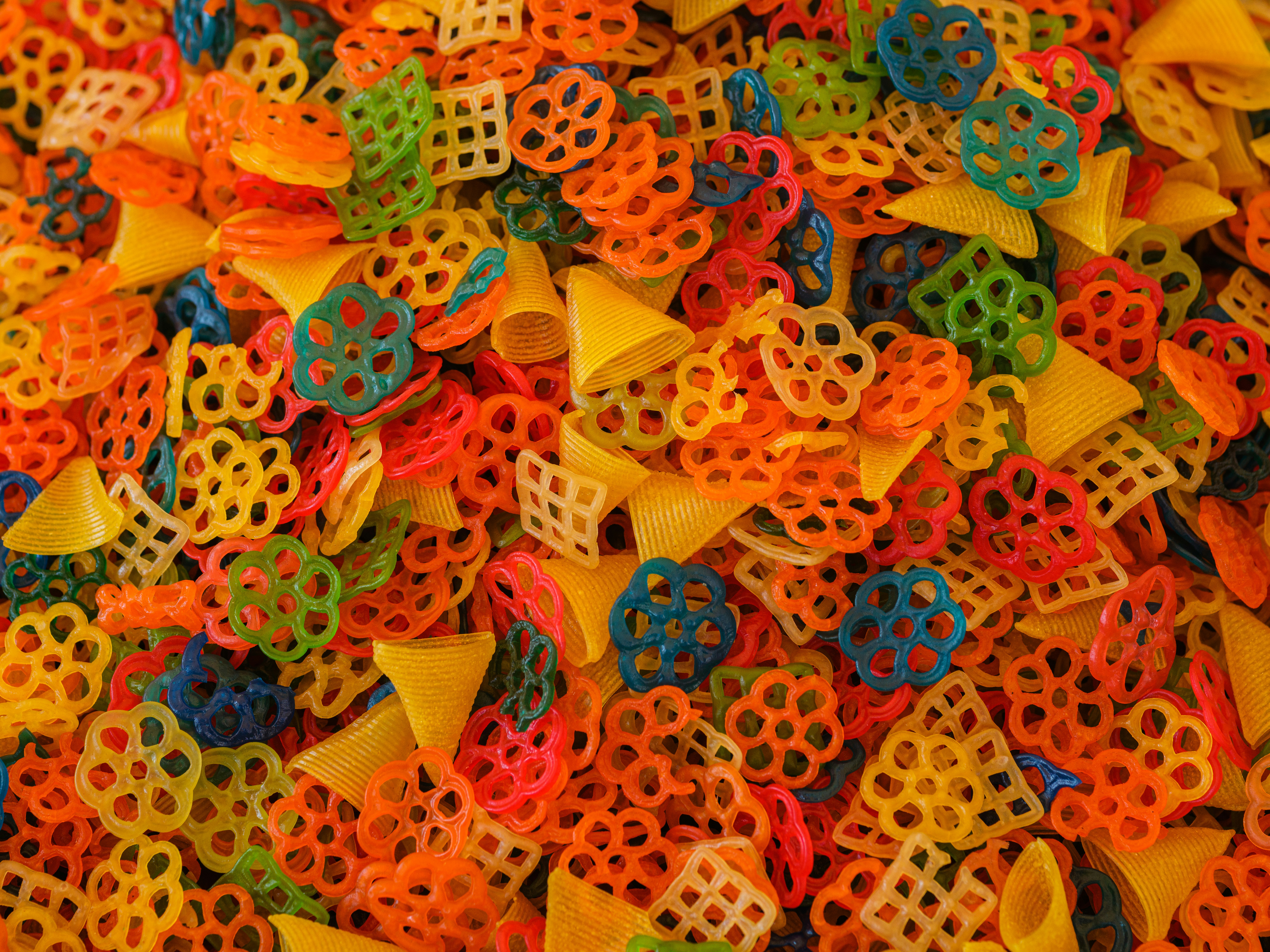 a close up of a pile of colorful hair bows