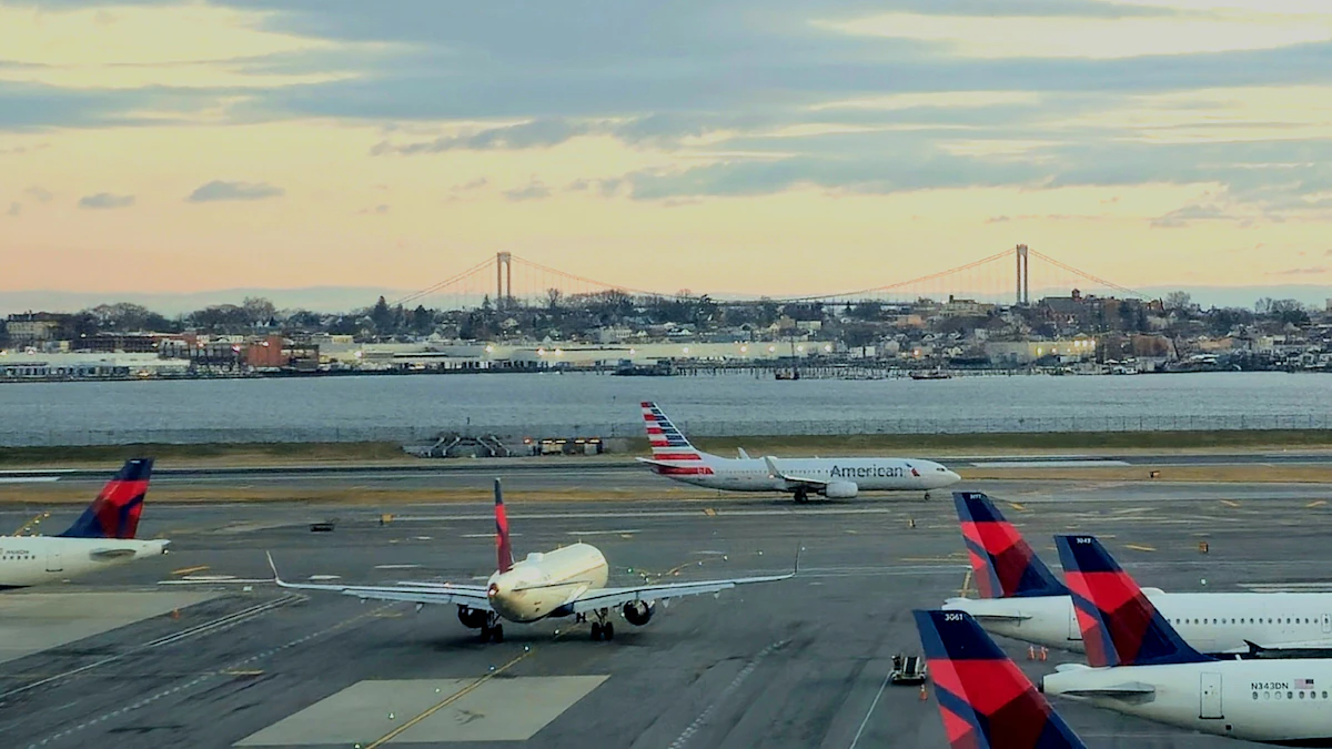 Aircraft tails lined up at gates at a New York airport terminal