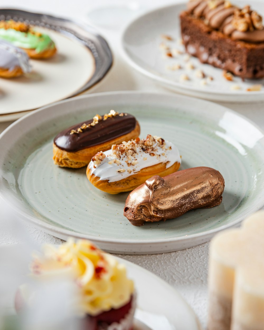 a white plate topped with different types of pastries