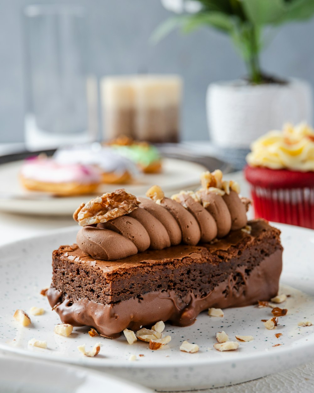 a piece of chocolate cake on a white plate