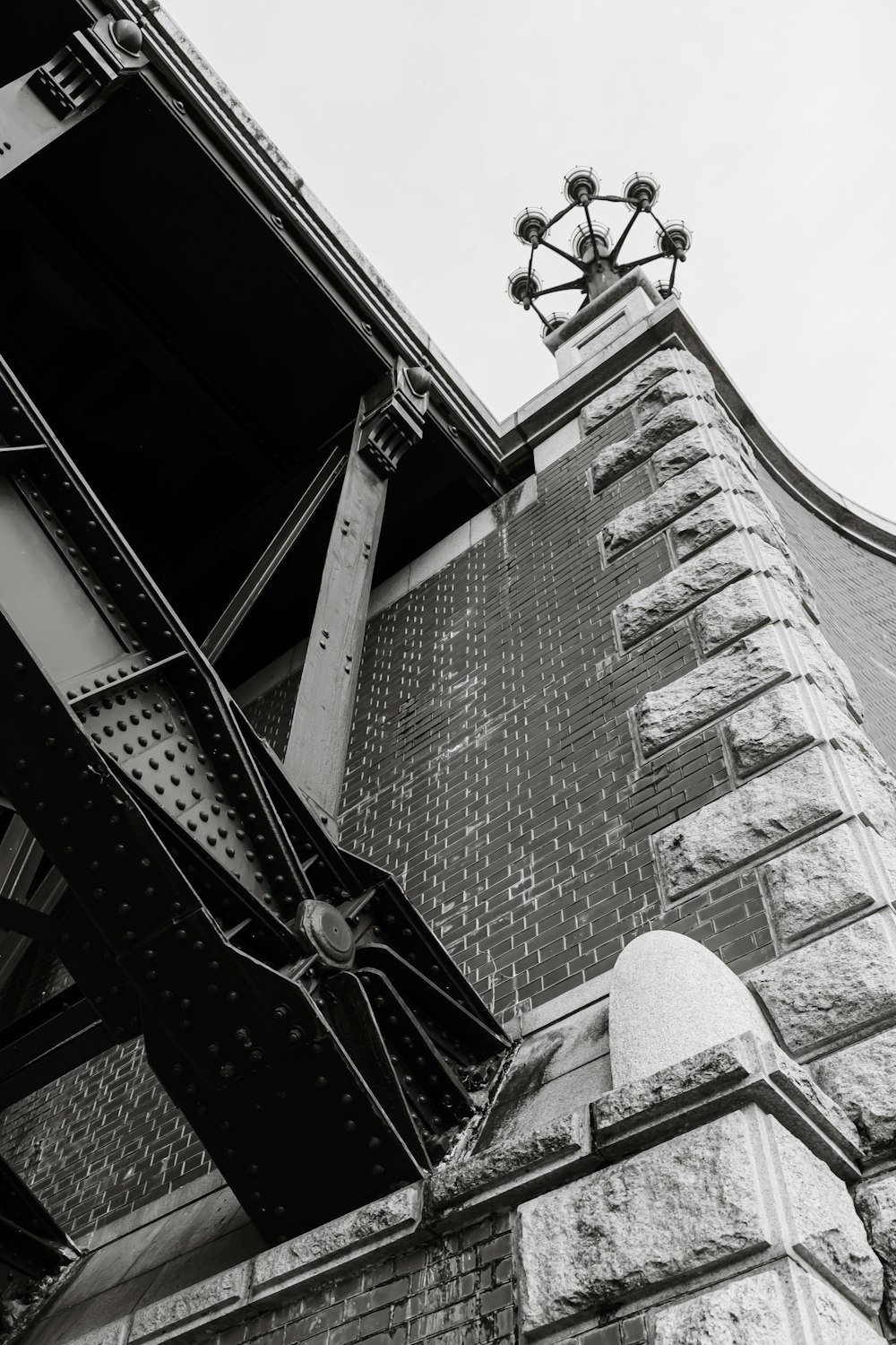 a black and white photo of a brick building