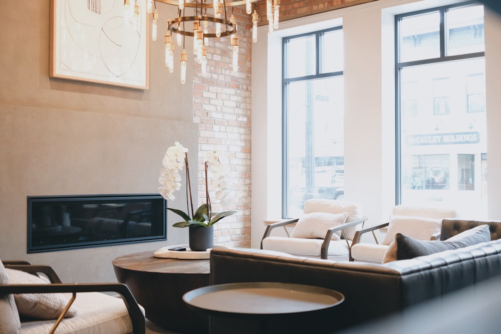 a living room filled with furniture and a fire place