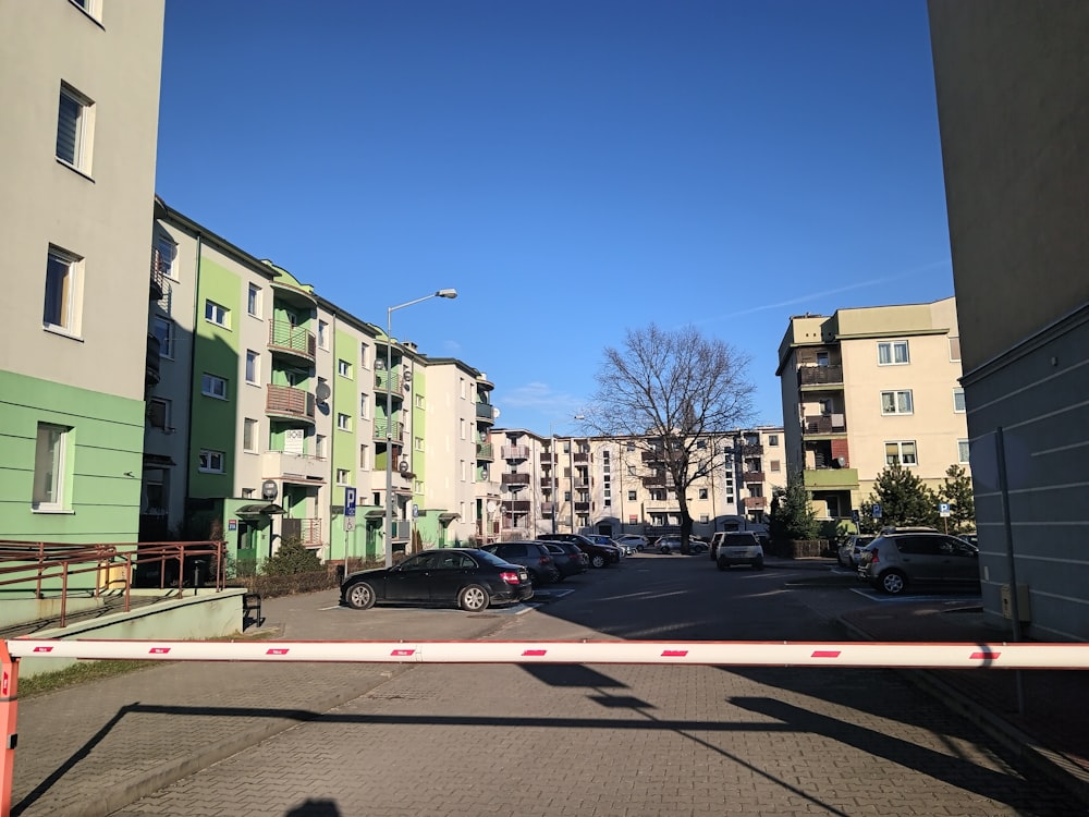 a street with cars parked on the side of it