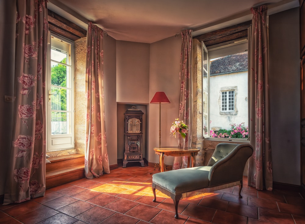 a living room with a chair and a table