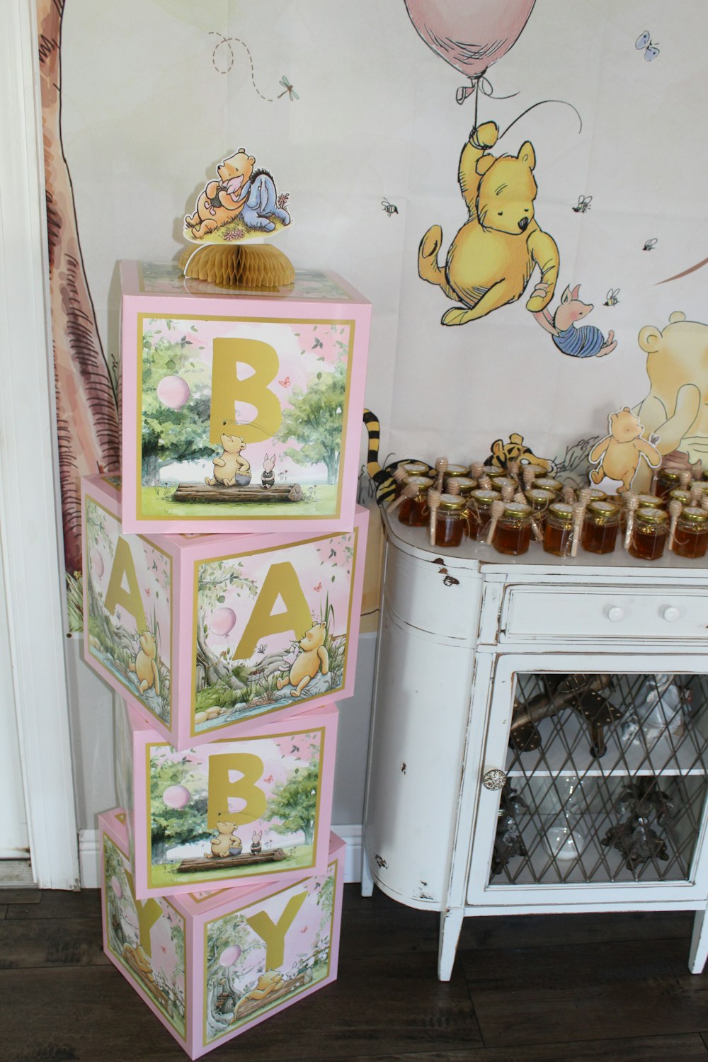 a baby shower with winnie the pooh decorations