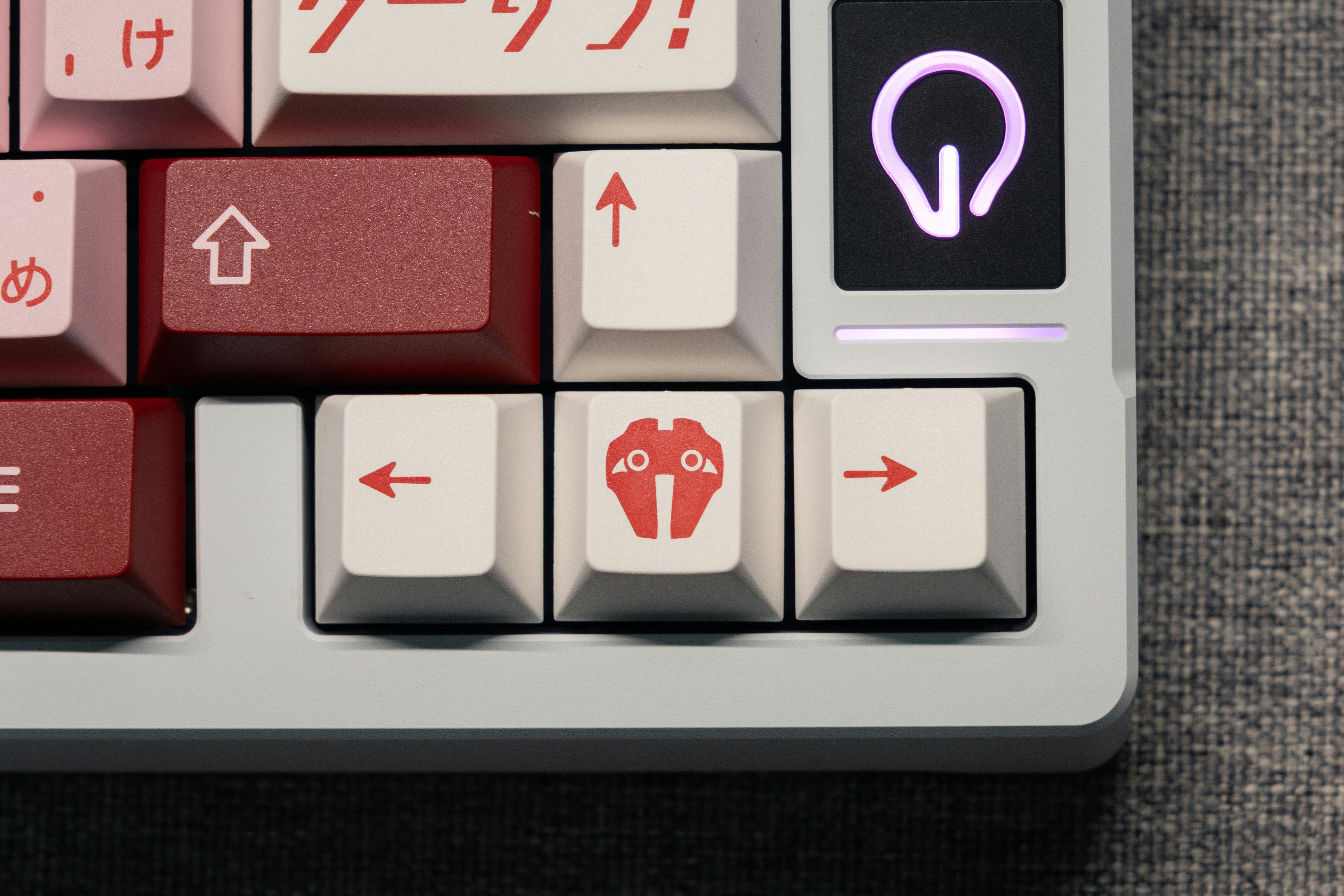 a close up of a keyboard with red and white keys