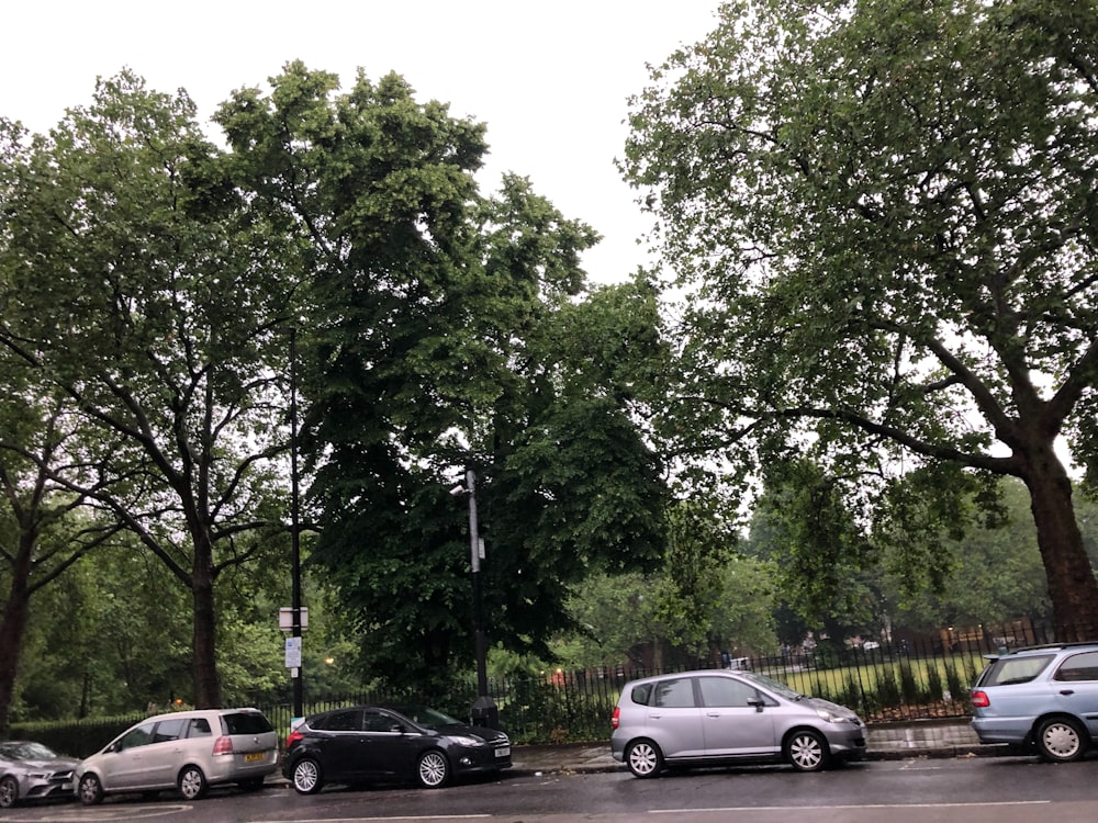 a group of cars parked on the side of a road