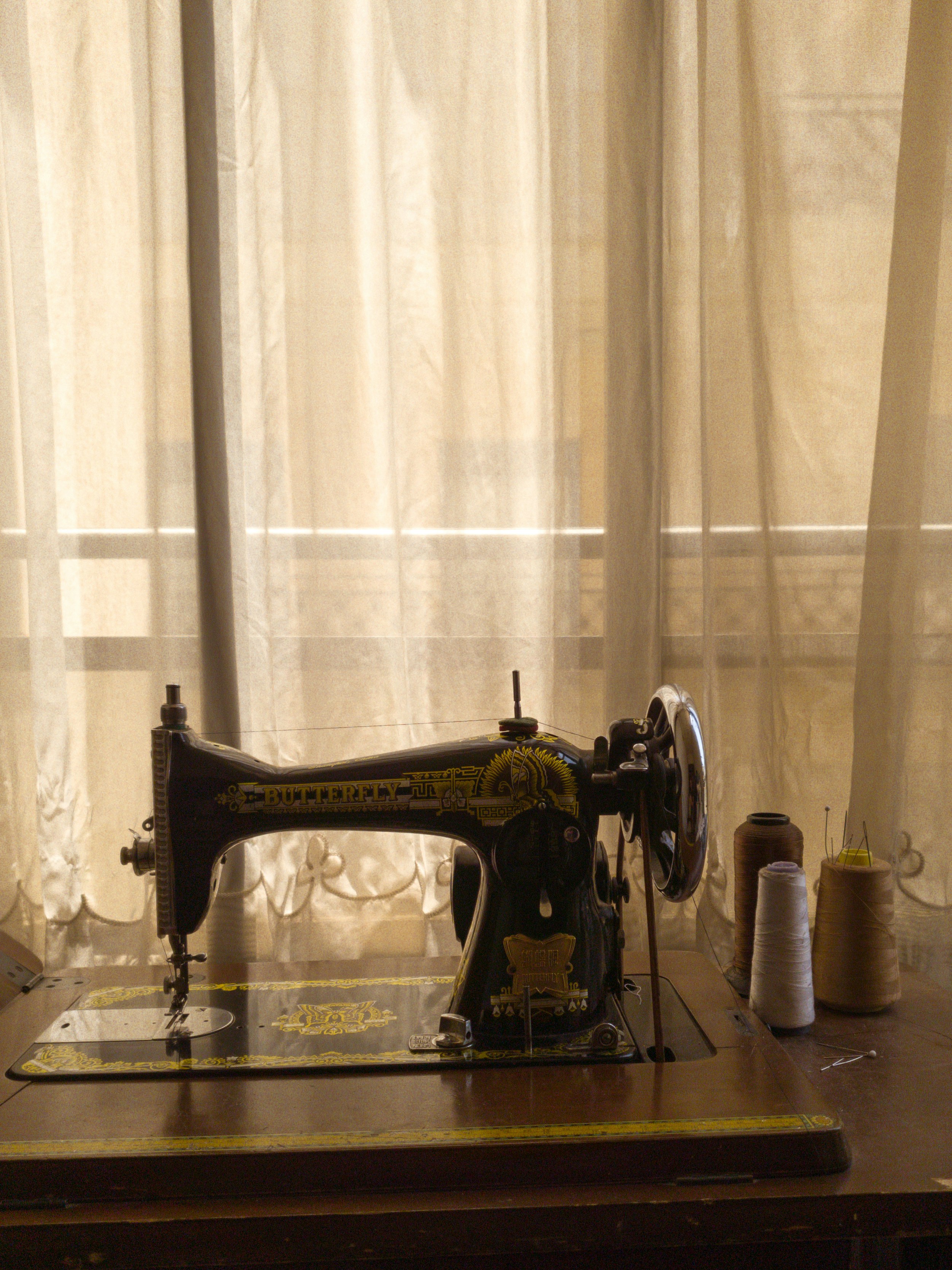 sewing machine on a wooden table