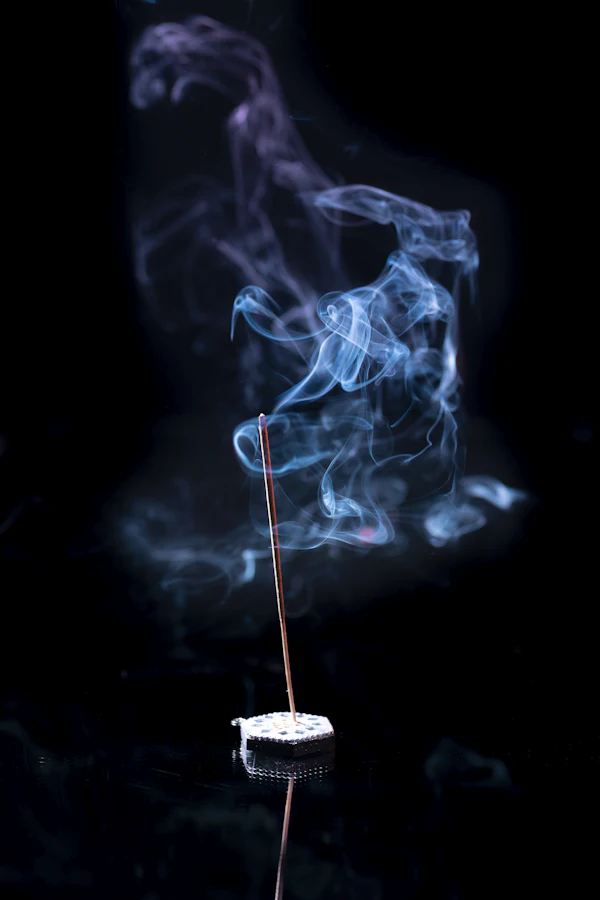 Bambooless herbal incense sticks with rising smoke