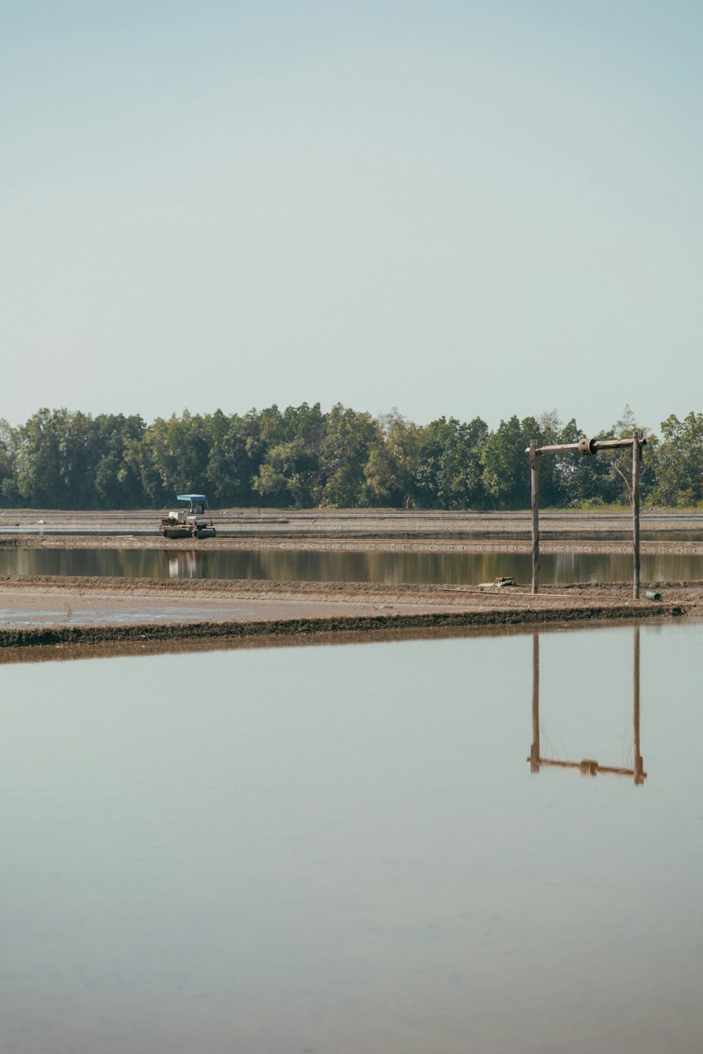 a large body of water with trees in the background