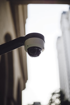 a close up of a security camera on a building