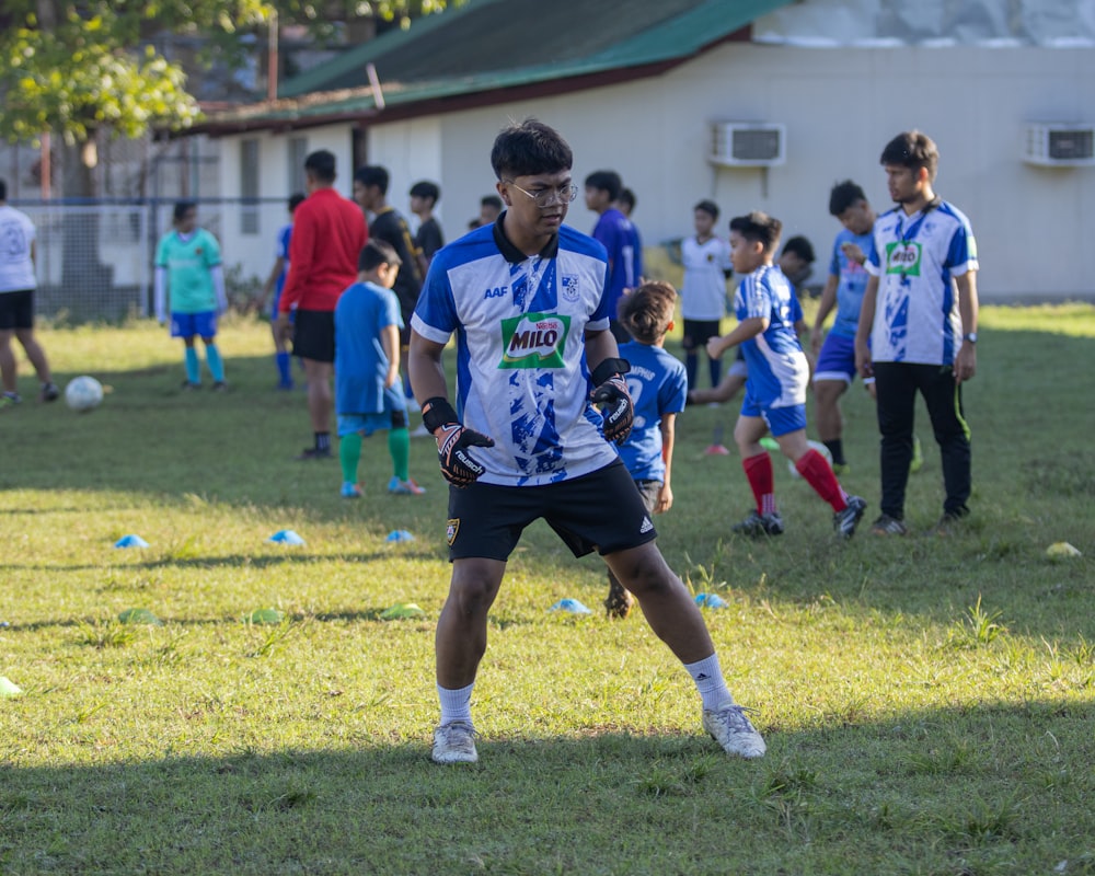 a group of young men playing a game of soccer