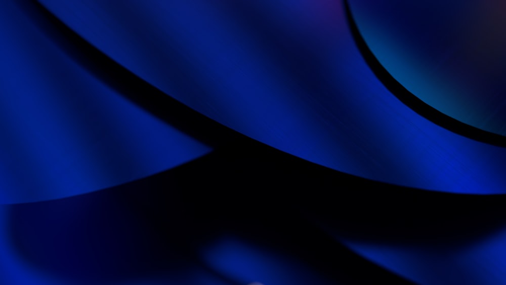 a close up of a cell phone with a blue background