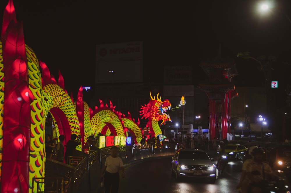 a street filled with lots of red and yellow decorations