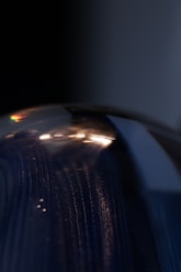 a close up of a shiny metal object