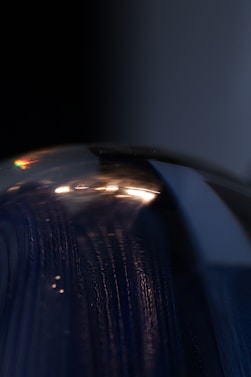 a close up of a shiny metal object