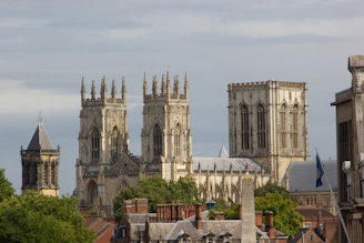 a view of a city with a cathedral in the background