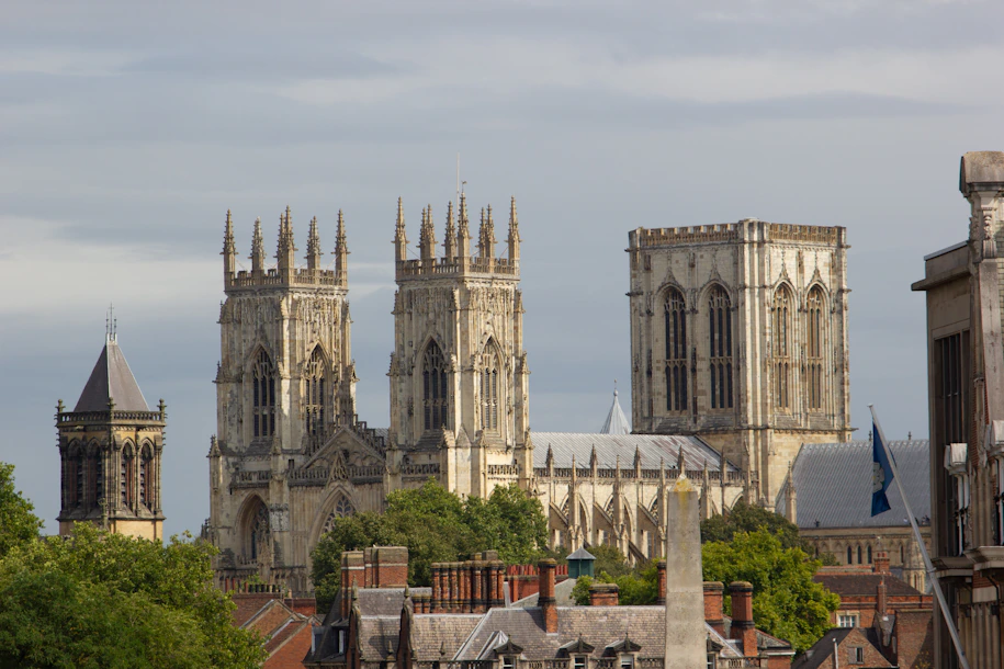 a view of a city with a cathedral in the background
